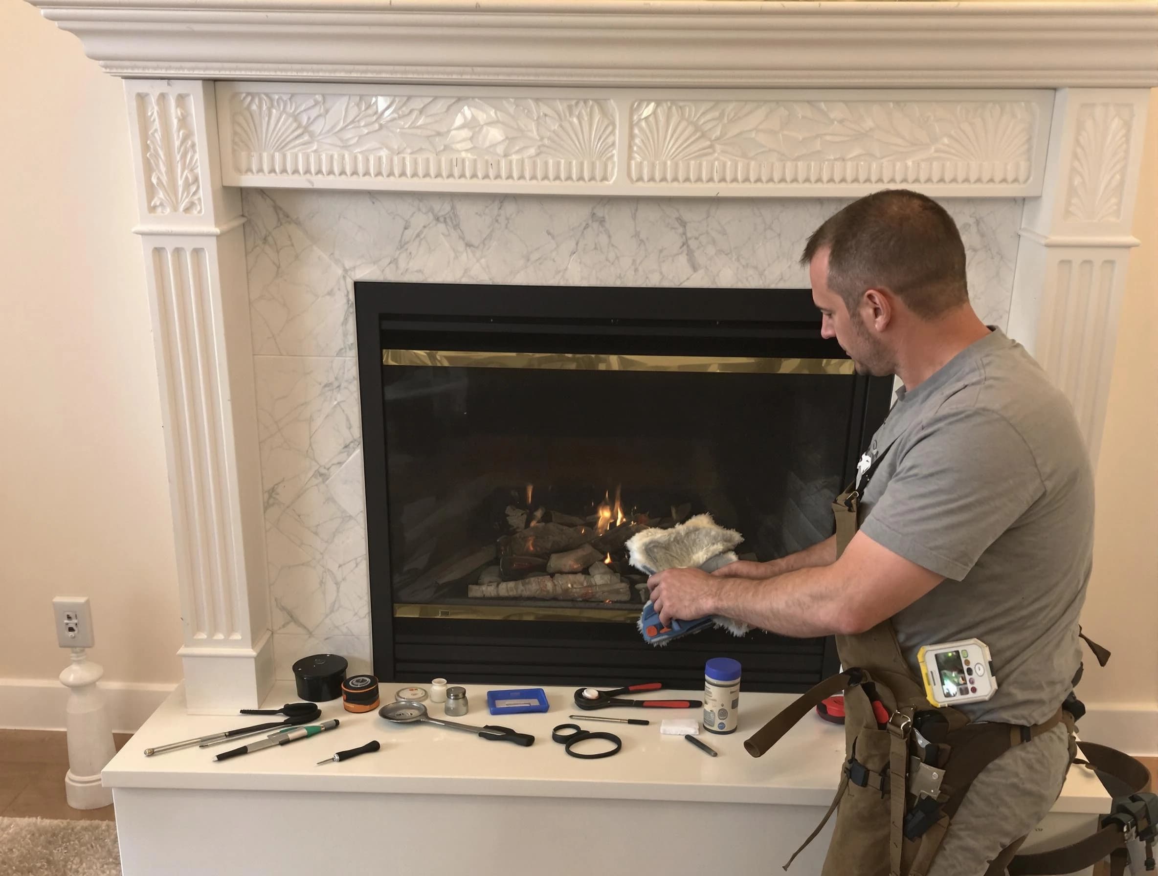 Casa Grande Chimney Sweep performing fireplace maintenance in Casa Grande, AZ